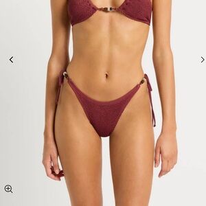 Bond-eye beaded tie side vista brief bikini bottoms